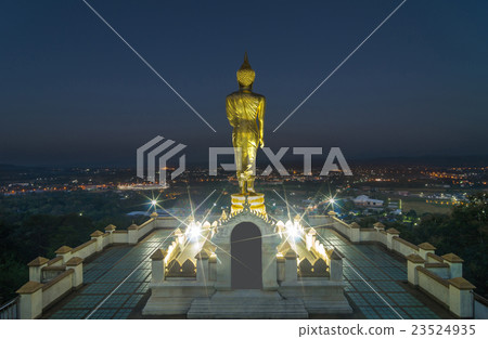 Buddha standing on a mountain at twilight time at Wat Phra That Khao Noi, Nan Province, Thailand, public domain Buddha standing on a mountain at twilight time at Wat Phra That Khao Noi, Nan Province, Thailand, public domain 23524935