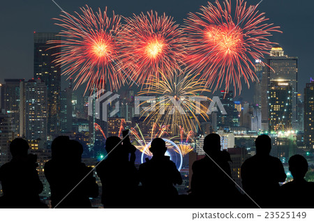 The silhouette of reporter photograph the Fantastic festive new years colorful fireworks with bangkok cityscape at night scene, holiday concept 23525149