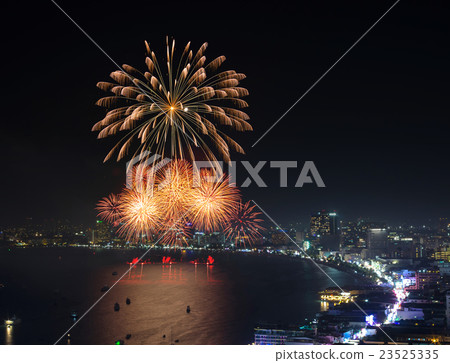 Multicolor fireworks night scene, blurred photo pattaya cityscape sea beach view, thailand Multicolor fireworks night scene, blurred photo pattaya cityscape sea beach view, thailand 23525335