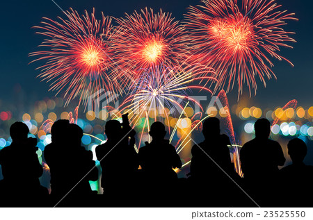 The silhouette of reporter photograph the Fantastic festive new years colorful fireworks on cityscape blurred photo bokeh,project success, holiday concept The silhouette of reporter photograph the Fantastic festive new years colorful fireworks on cityscape blurred photo bokeh,project success, holiday concept 23525550