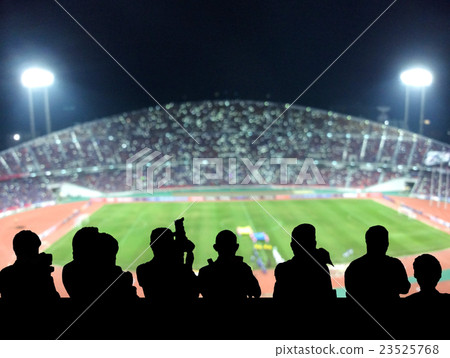 The silhouette of reporter photograph the panorama of Abstract blurred photo of fan sport at stadium, sport background concept The silhouette of reporter photograph the panorama of Abstract blurred photo of fan sport at stadium, sport background concept 23525768