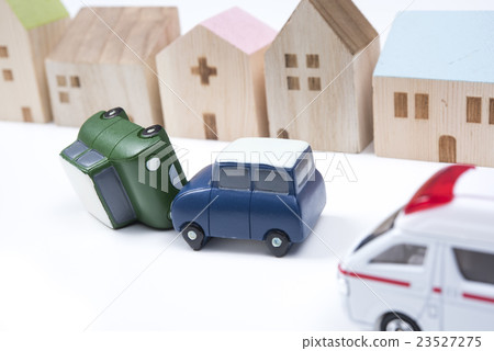An ambulance arrives at a traffic accident scene An ambulance arrives at a traffic accident scene 23527275