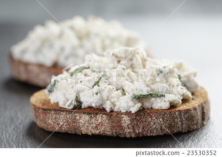 rye sandwiches or bruschetta with ricotta cheese 23530352