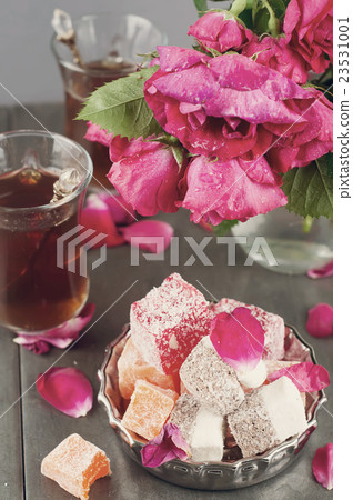 glass of Turkish tea and rahat Delight 23531001