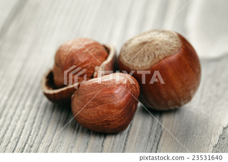 organic hazelnuts on wood table organic hazelnuts on wood table 23531640