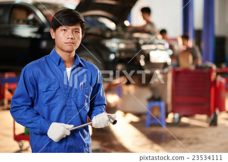 Young repairman 23534111