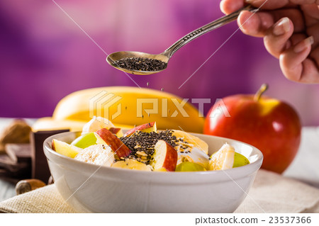 Healthy breakfast with apple, banana and chia seed 23537366