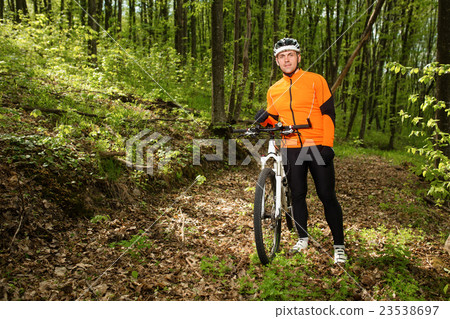 Cyclist Riding the Bike on a Trail in Summer 23538697