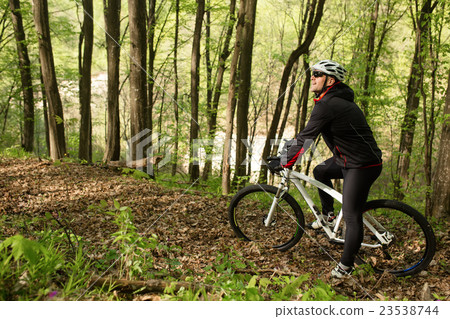Cyclist Riding the Bike on a Trail in Summer 23538744