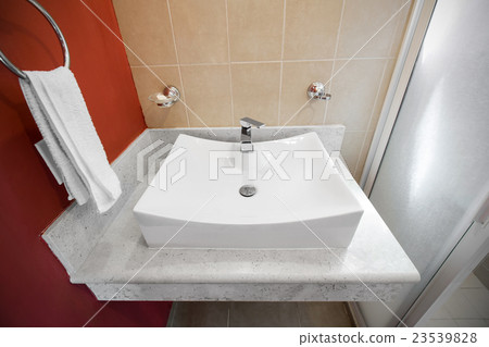 Faucet in bathroom Faucet in bathroom 23539828