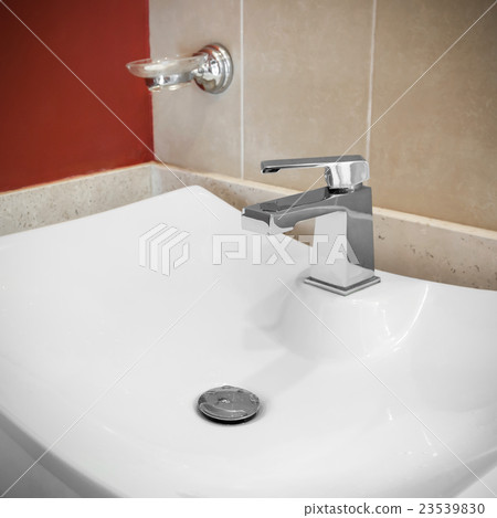 Faucet in bathroom Faucet in bathroom 23539830