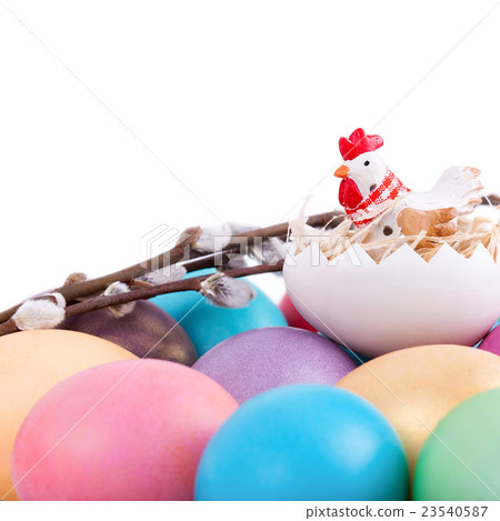 Chicken toy on easter eggs Chicken toy on easter eggs 23540587