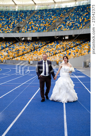 Newlyweds at the stadium Newlyweds at the stadium 23542375