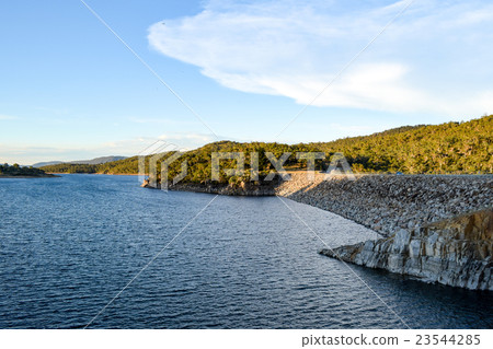 Lake Jindabyne in the shadows of a mountain range Lake Jindabyne in the shadows of a mountain range 23544285