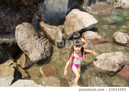 Children playing water 23554393