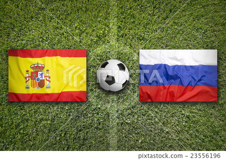 Spain vs. Russia flags on soccer field Spain vs. Russia flags on soccer field 23556196