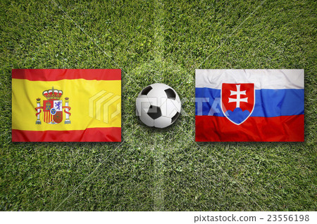 Spain vs. Slovakia flags on soccer field Spain vs. Slovakia flags on soccer field 23556198