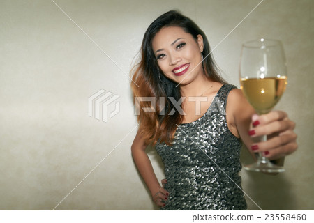 Toasting woman 23558460