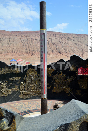 A thermometer in the city of Turpan in the Xinjiang Uighur Autonomous Region in the west of China points to 67 degrees Celsius. 23559588