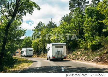Motorhome Car Goes On Road On Background Of French 23562220