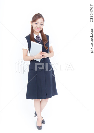 A receptionist with a tablet terminal 23564767