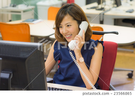 Women calling in the office 23566865
