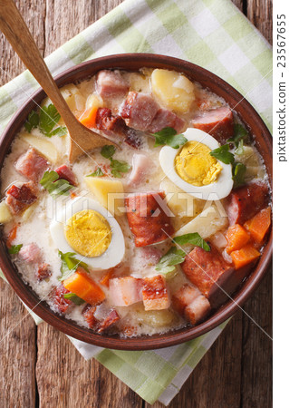 Delicious Polish soup Zurek with sausage and eggs 23567655