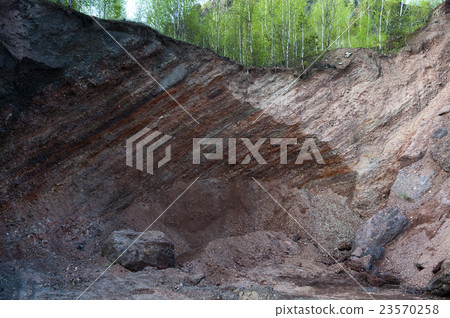 Waste heaps of red rock in industrial district Waste heaps of red rock in industrial district 23570258