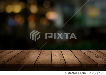 wooden table of abstract background of cafe lights wooden table of abstract background of cafe lights 23571738