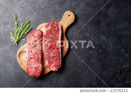 Raw striploin steak Raw striploin steak 23576212