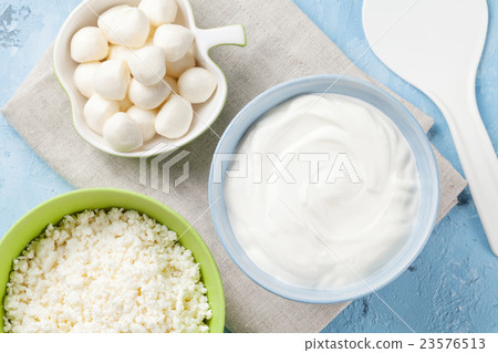 Dairy products on stone table 23576513