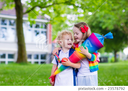 Kids with candy cone on first school day. Germany Kids with candy cone on first school day. Germany 23578792