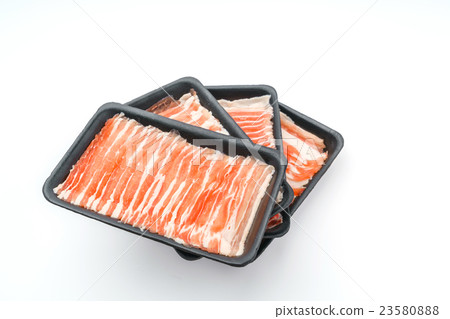 Slide of raw pork on white background . 23580888
