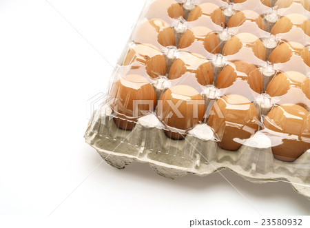 Fresh eggs in package on White Background . 23580932