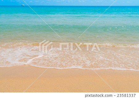 Wave of sea on the sand beach 23581337