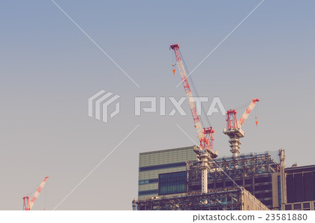 Crane and building construction site ( Filtered image processed vintage effect. ) Crane and building construction site ( Filtered image processed vintage effect. ) 23581880