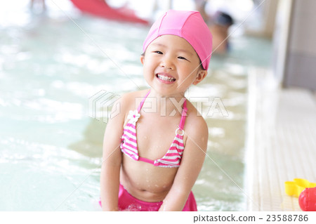 girl wear swimsuit play happily girl wear swimsuit play happily 23588786