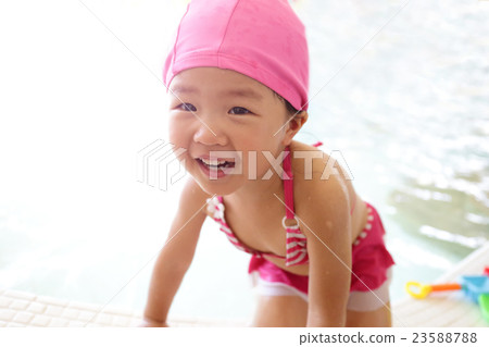 girl wear swimsuit play happily girl wear swimsuit play happily 23588788