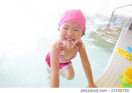 girl wear swimsuit play happily girl wear swimsuit play happily 23588789