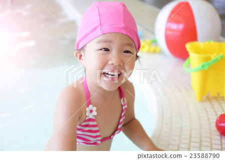 girl wear swimsuit play happily girl wear swimsuit play happily 23588790