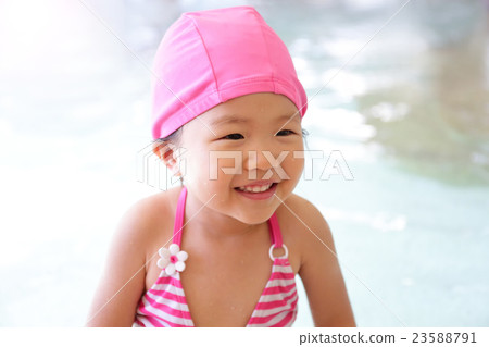 girl wear swimsuit play happily girl wear swimsuit play happily 23588791