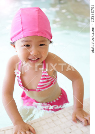 girl wear swimsuit play happily girl wear swimsuit play happily 23588792