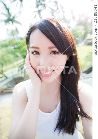 young woman smile to you 23589641