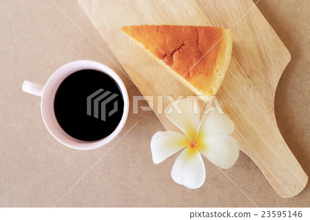 Japanese style Cheesecake and cup of black coffee. Japanese style Cheesecake and cup of black coffee. 23595146