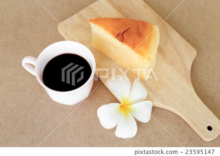 Japanese style Cheesecake and cup of black coffee. Japanese style Cheesecake and cup of black coffee. 23595147