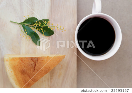 Japanese style Cheesecake and cup of black coffee. Japanese style Cheesecake and cup of black coffee. 23595167