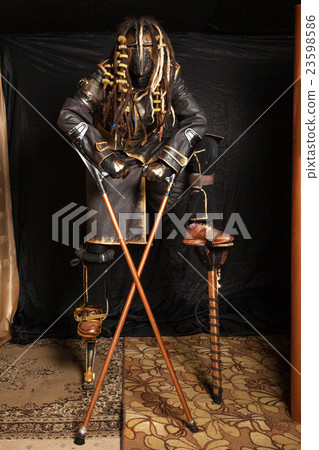 Man in a mask in a cyborg costume 23598586