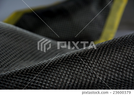 Carbon fiber Kevlar composite material background Carbon fiber Kevlar composite material background 23600379
