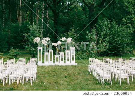 wedding ceremony in a beautiful garden. white 23609934