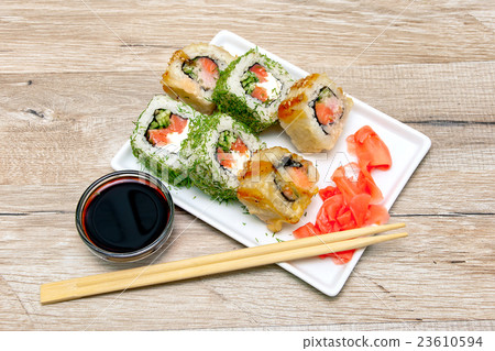 rolls on a plate with ginger and soy sauce rolls on a plate with ginger and soy sauce 23610594